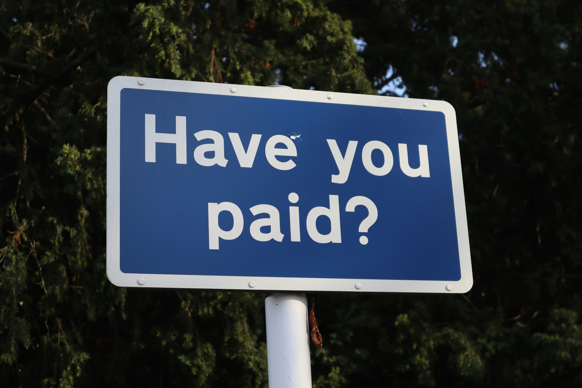 A have you paid sign representing metered AI tooling costs